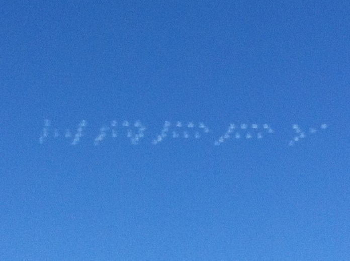 For the final day of the “1 new thing a day challenge,” I went to the Chicago Air and Water Show for the first time.  This picture is courtesy of a fleet of skywriters. 